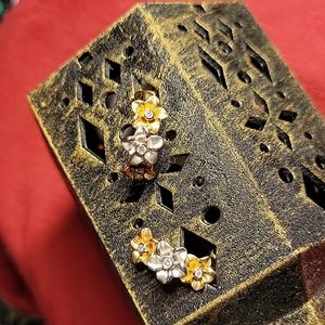 Stamped 14k. Pierced flower earrings